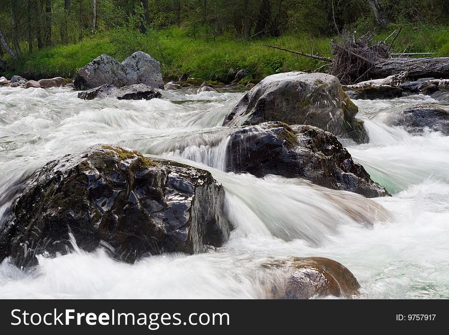 Big stones in the stream. Big stones in the stream