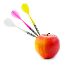 Apple And Darts Stock Photography