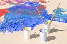 Used Paint Brushes Of Different Colors And Paper Royalty Free Stock Photos