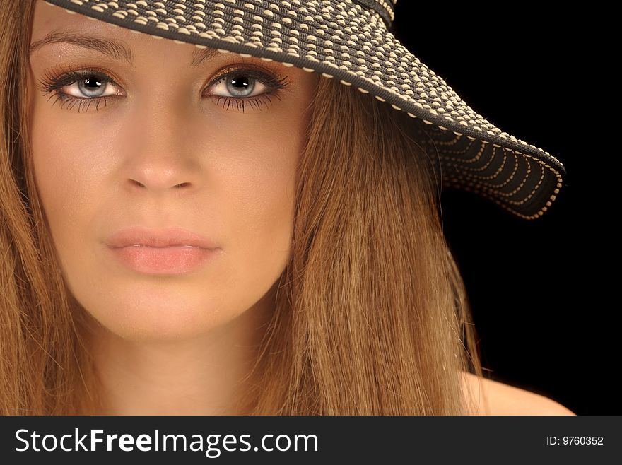 Beautiful image of a Model with a Hat On Black. Beautiful image of a Model with a Hat On Black
