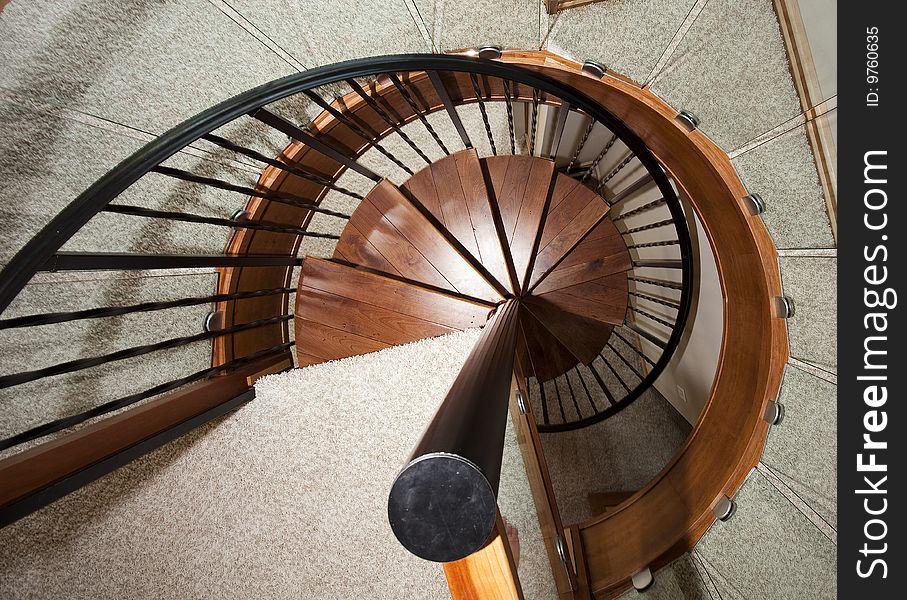 Wooden spiral staircase looking down