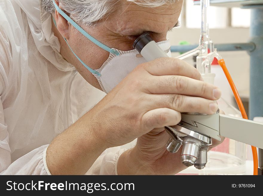 A researcher at work in his laboratory. A researcher at work in his laboratory