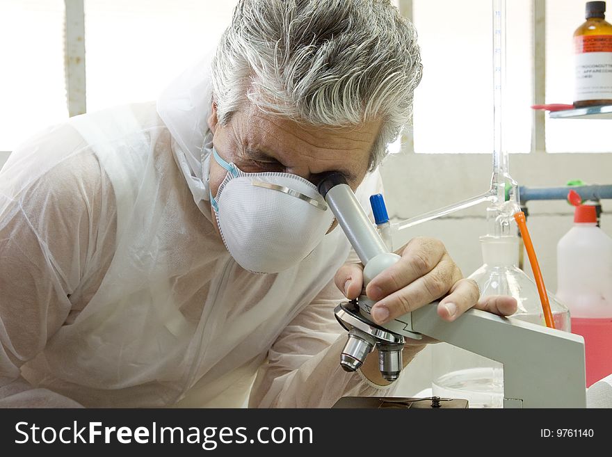 A researcher at work in his laboratory. A researcher at work in his laboratory