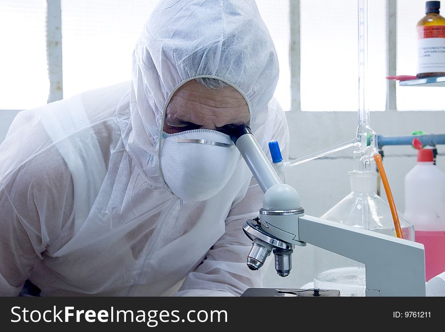 A researcher at work in his laboratory. A researcher at work in his laboratory