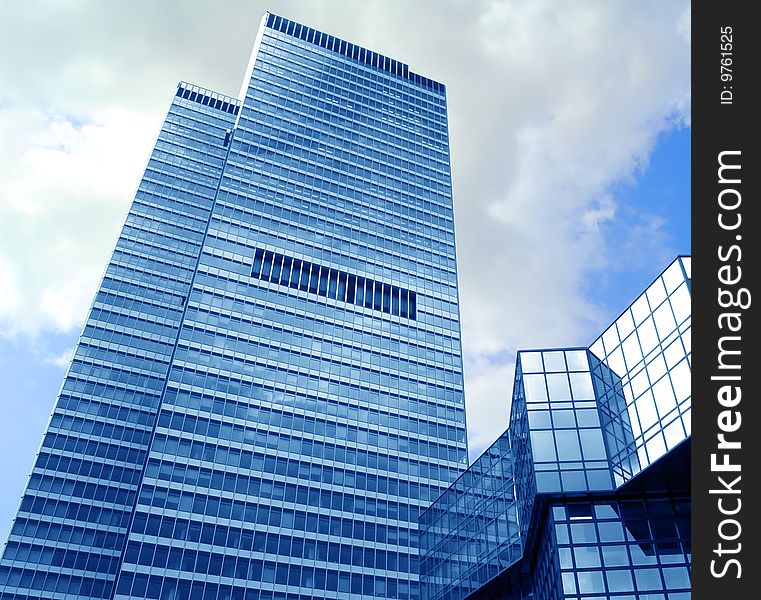 High modern skyscraper on a background of the blue sky