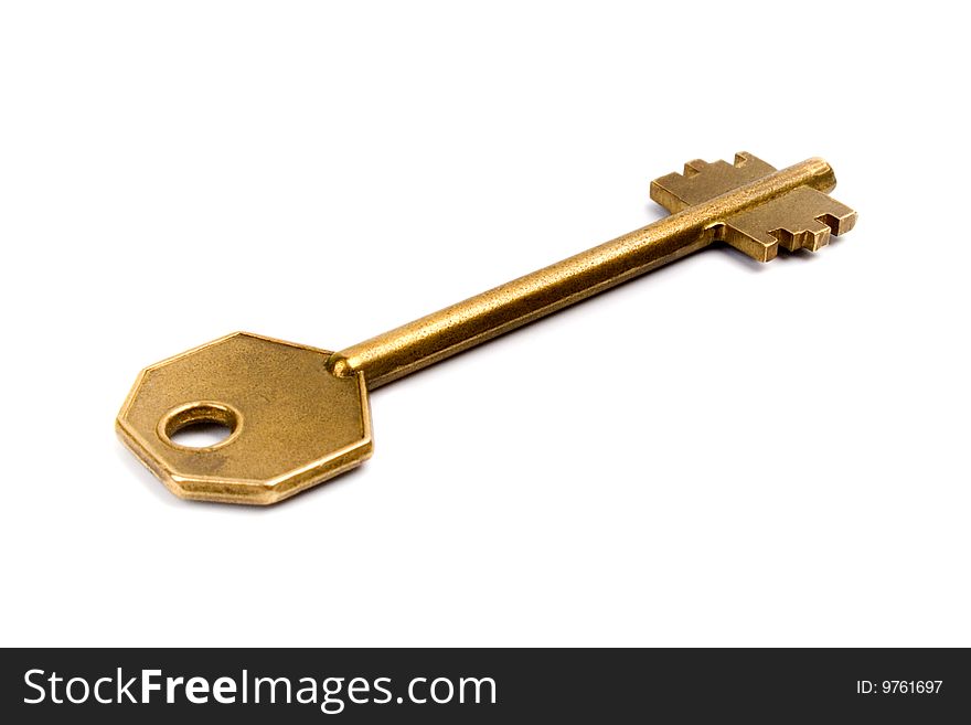 Old golden key isolated on white background