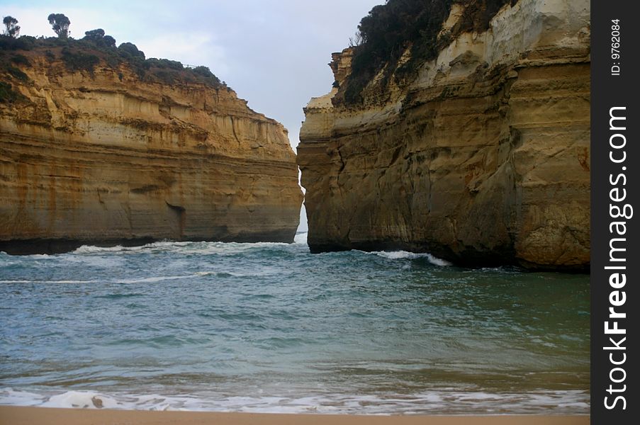 Loch Ard Gorge is one of the places to visit in the Port Campbell area of Victoria, Australia. In summertime you absolutely have to pack a picnic basket and spend the day there. It really is one of those sensational spots where you can relax, have a swim or muck about on the beach.

To the east of the gorge are the famous limestone towers of The Twelve Apostles that stand up to 45 metres from the pounding waves of the Great Southern Ocean. 

These magnificent structures are formed over thousands of years as the churning seas undermine the soft limestone around them and when that collapses leaves the formation standing out from the cliffs.