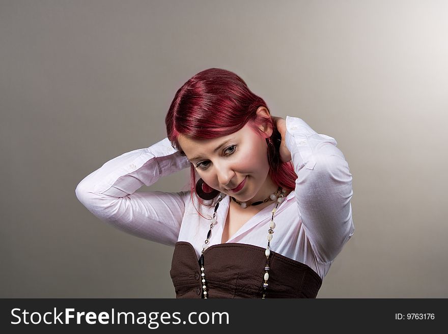 Red haired girl separated over grey