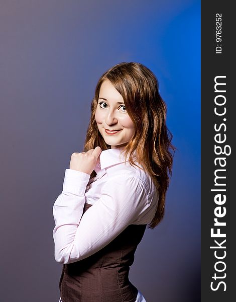 Smiling girl with hands lifted up isolated. Smiling girl with hands lifted up isolated