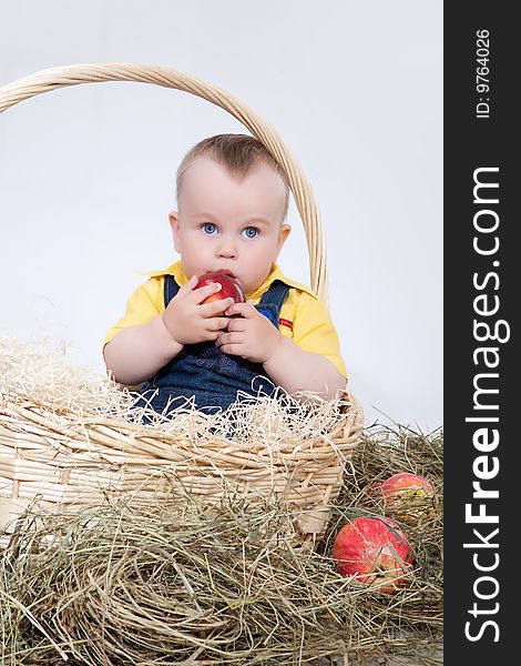 Little child in wicker basket. Little child in wicker basket