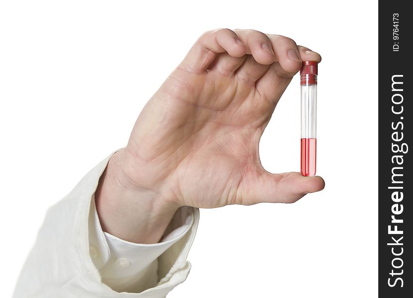 Hand of a scientist or chemist holds a test tube. Hand of a scientist or chemist holds a test tube