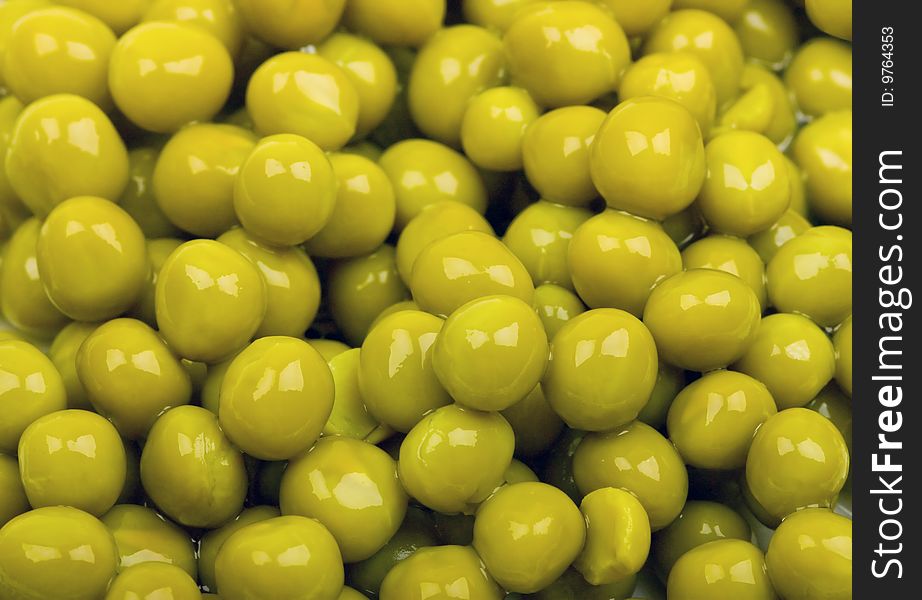 Close-up of green peas to background
