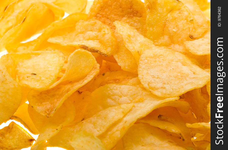 Close-up potato chips to background