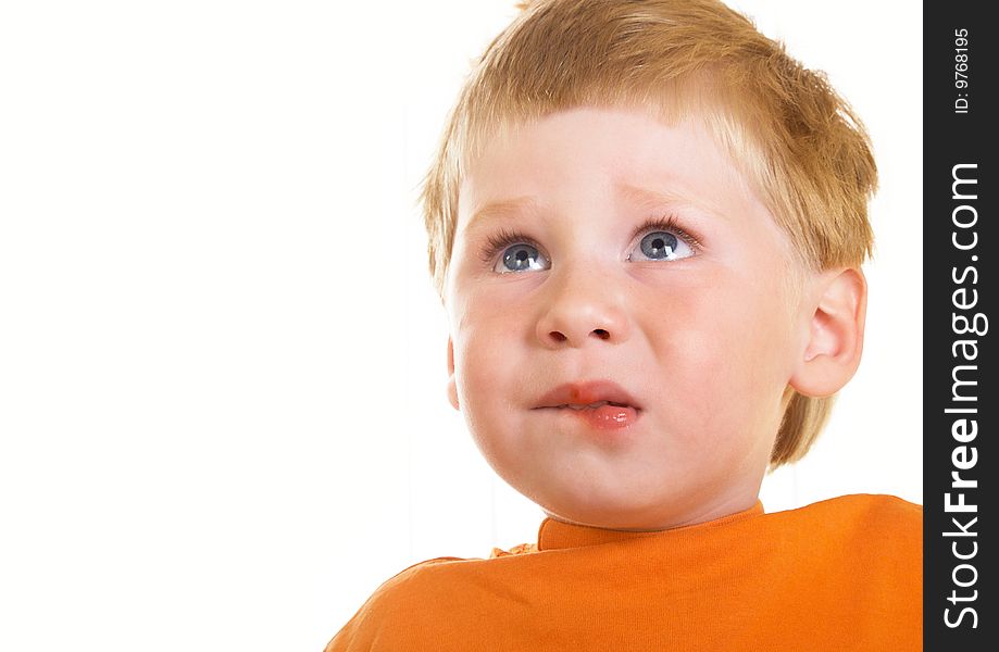 Portrait of the crying boy on a white background. Portrait of the crying boy on a white background