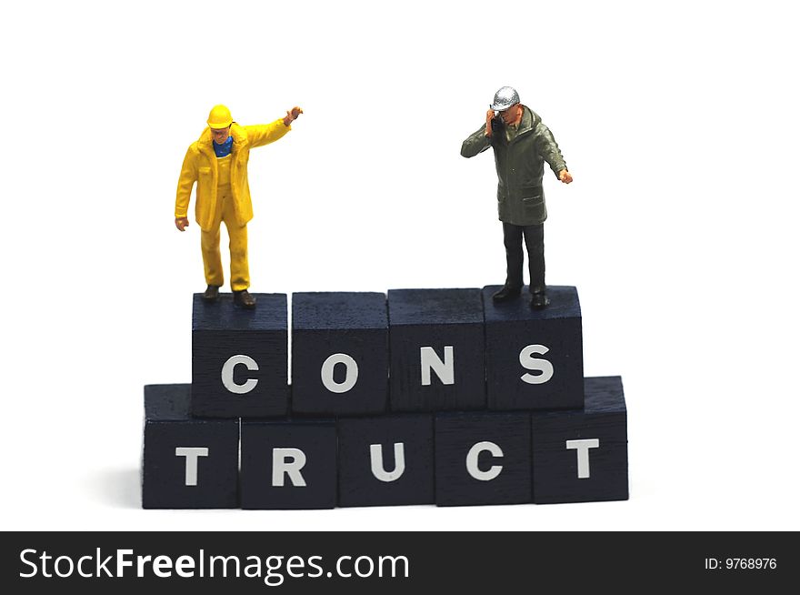 Two workers on the word construct