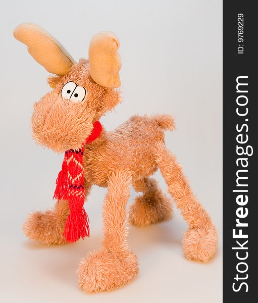 Soft toy brown Deer with a red scarf