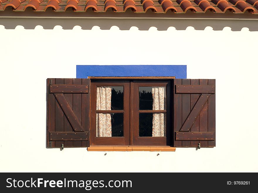 WINDOW OF REMODELED COTTAGE WITH TRADITIONAL ARCHITECTURE. WINDOW OF REMODELED COTTAGE WITH TRADITIONAL ARCHITECTURE