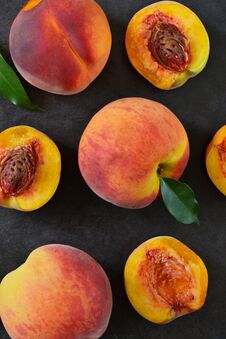 Fresh, Juicy Peaches On A Black Stone Background. Stock Photos