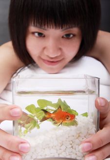 Asian Girl With Her Goldfish Royalty Free Stock Image Asian Girl With Her Goldfish Royalty Free Stock Image