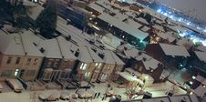 Nighttime Cityscape With Snow Stock Image