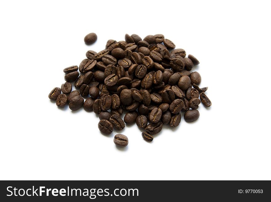 Coffee beans close-up on white background