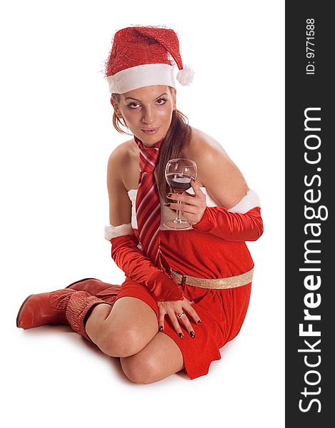 Pretty santa girl drinking a red wine