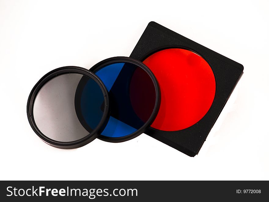 A set of assorted Camera filters, one is a CPL and one is a blue intensifier and one is a red gel. A set of assorted Camera filters, one is a CPL and one is a blue intensifier and one is a red gel.
