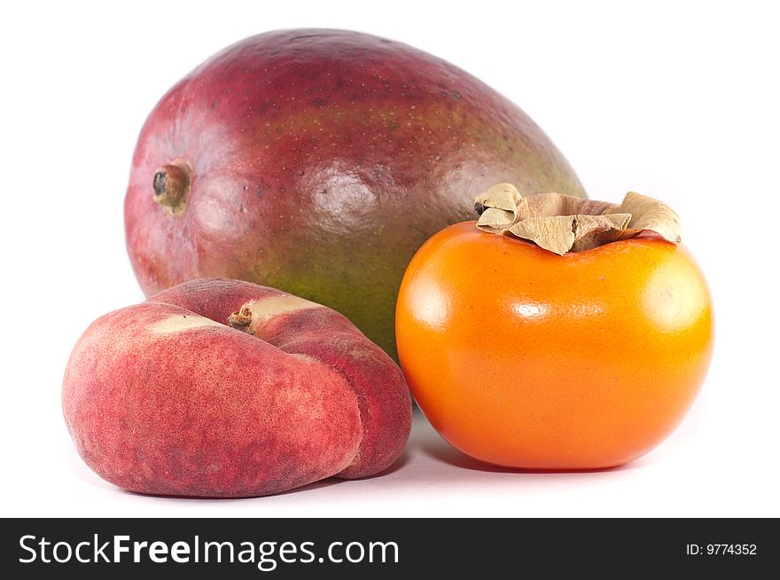 A small group of tropical fruits isolated on a white background