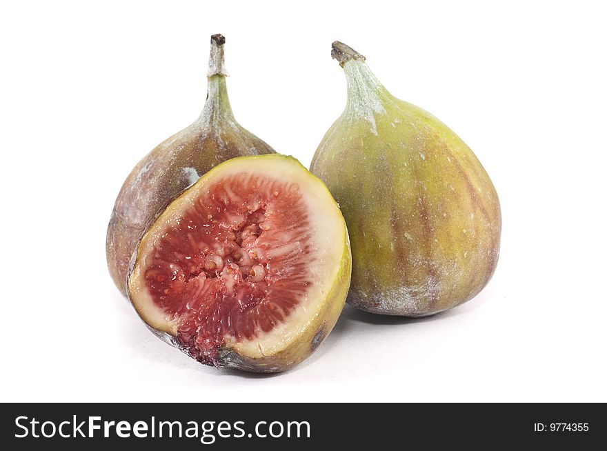 A small group of figs isolated on a white background