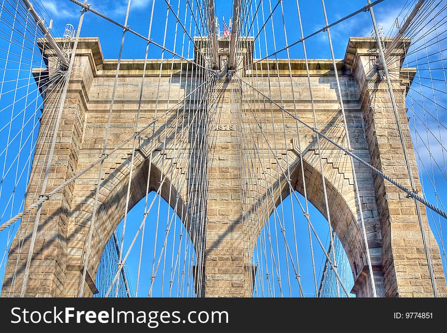 View of some architectural detail of the Brooklyn Bridge in New York city, USA.