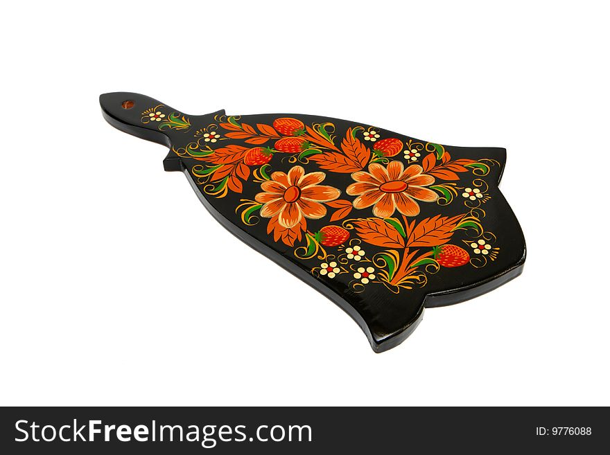 Russian traditional black cutting board painted with flowers isolated. Russian traditional black cutting board painted with flowers isolated