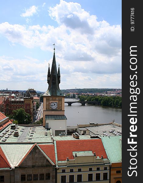 Prague roof tops and clouds sky