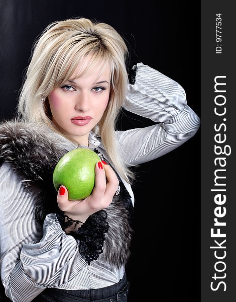 Girl in fur with apple. Girl in fur with apple