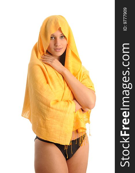 Pretty young woman posing, wearing a yellow cloth