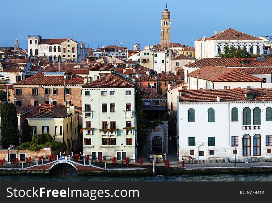 The Venice view with a leaning tower in a background (Italy). The Venice view with a leaning tower in a background (Italy).