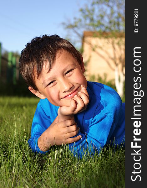 Little boy in green grass