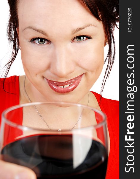 Attractive woman with a glass of red wine isolated on white