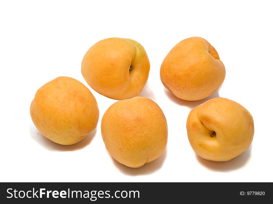 Apricots isolated on white background