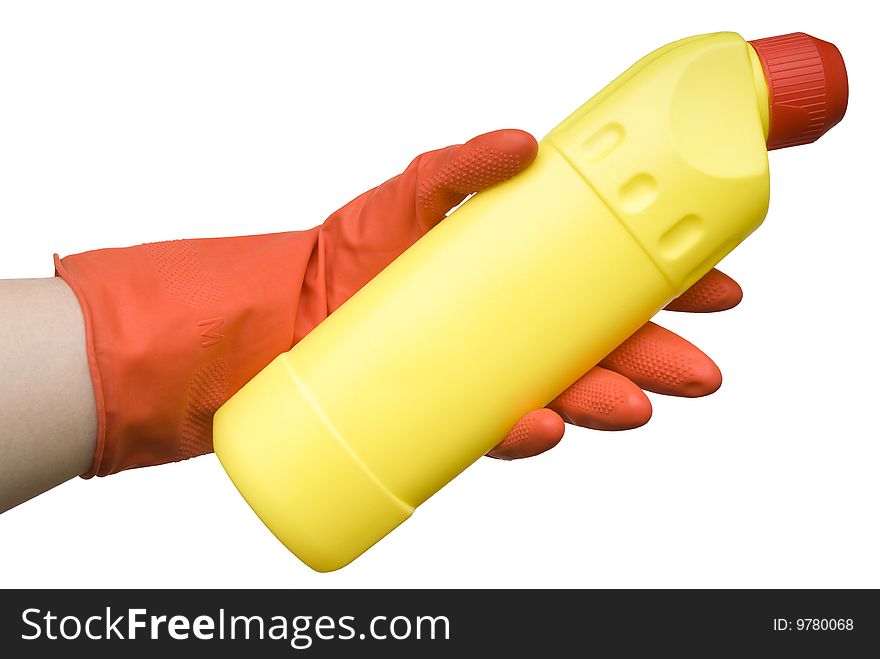 Female hand in a red rubber glove holding a yellow bottle isolated on white background. Female hand in a red rubber glove holding a yellow bottle isolated on white background