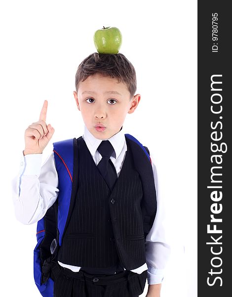 Schoolboy with backpack and apple isolated on white. Schoolboy with backpack and apple isolated on white