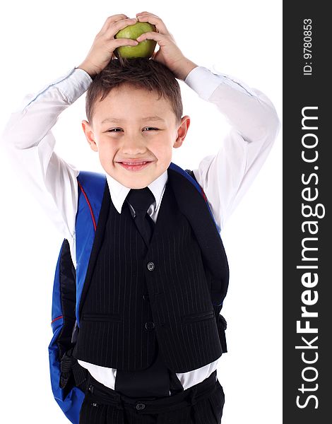 Schoolboy with backpack and apple isolated on white. Schoolboy with backpack and apple isolated on white