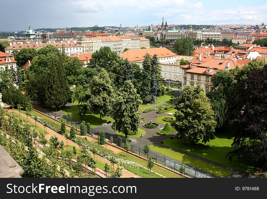 View of Prague from prague castle garden. In the forefront, there is Lobkowicz garden. View of Prague from prague castle garden. In the forefront, there is Lobkowicz garden.