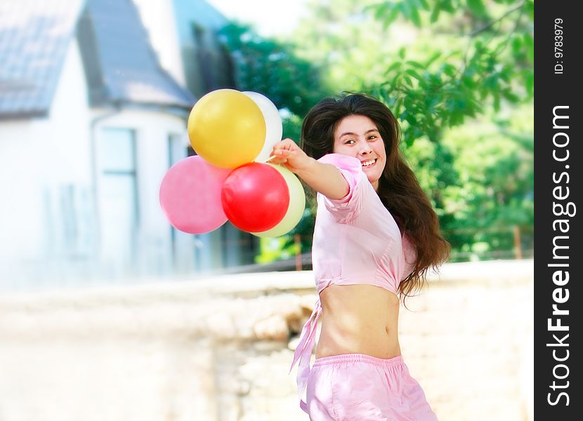 Happy girl with colorful balloons. Happy girl with colorful balloons