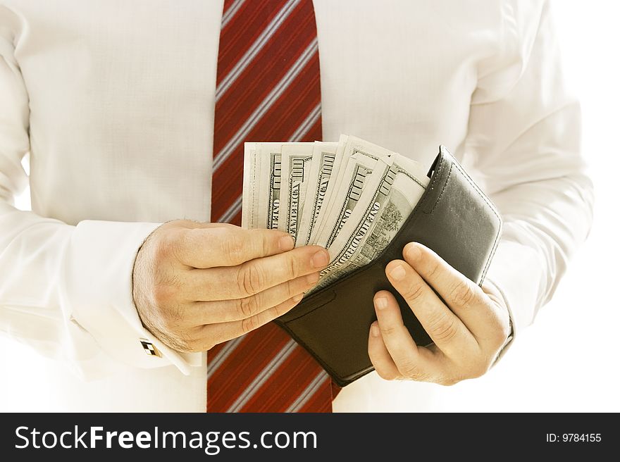 Business men with many banknotes on his wallet