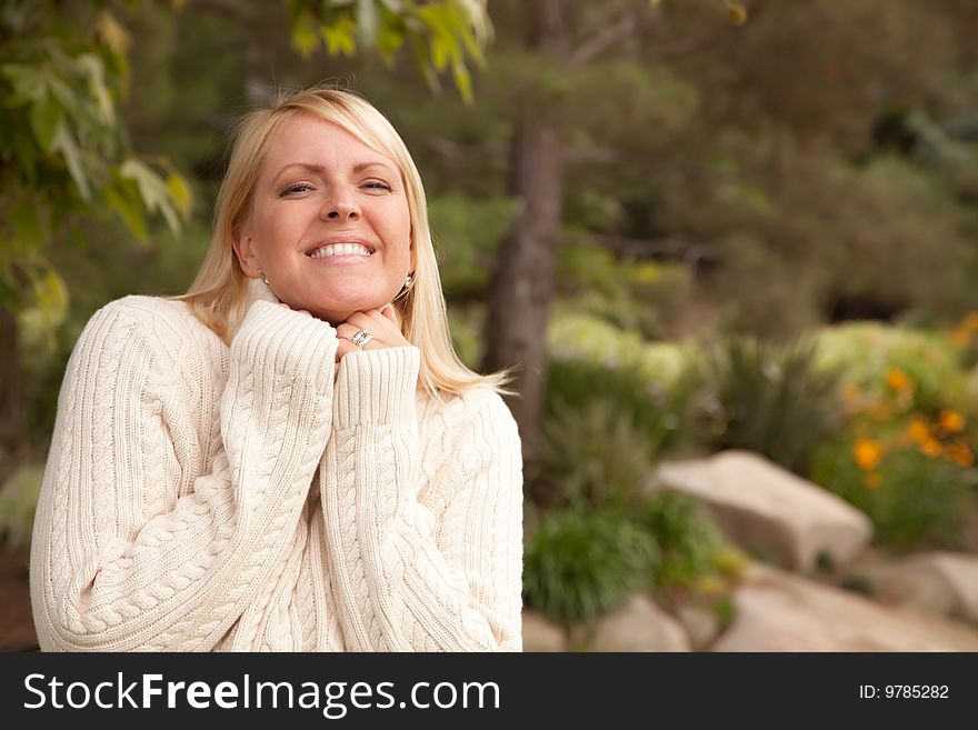 Attractive Blonde Woman Portrait in the Park. Attractive Blonde Woman Portrait in the Park.