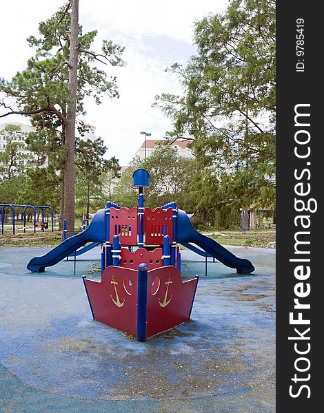 A playground with slides shaped into a boat