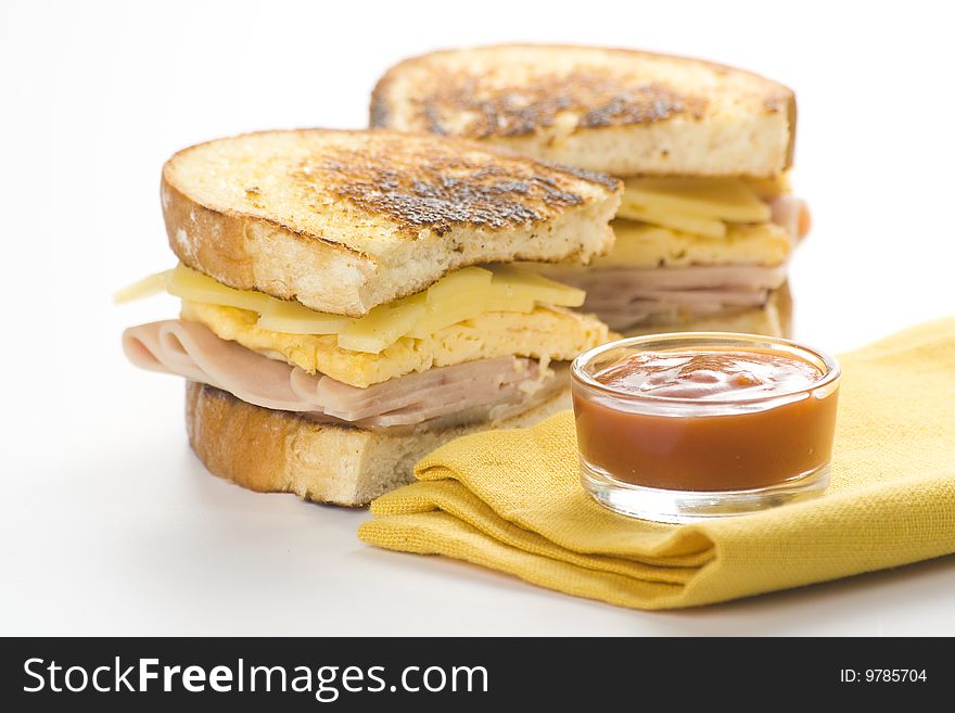 Tasty sandwich of ham and cheese omelet