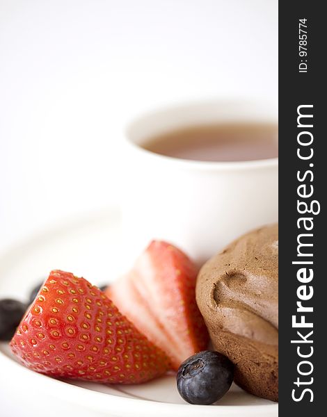 Cup Of Tea With Strawberries And Muffin