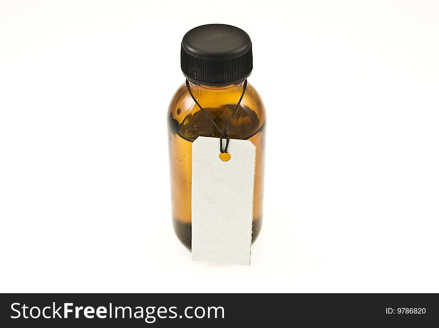 Brown glass bottle with tag

isolated on white