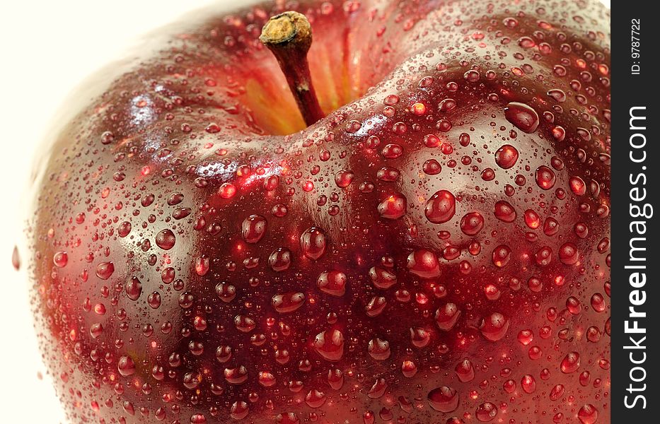 Red delicious apple with droplets on it. Red delicious apple with droplets on it